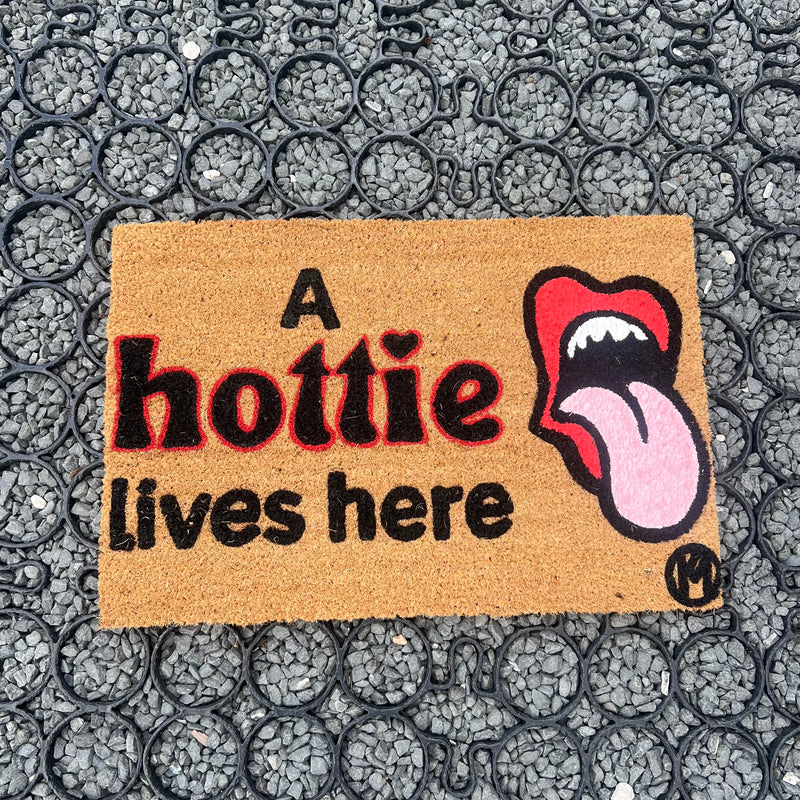 A HOTTIE LIVES HERE MAT