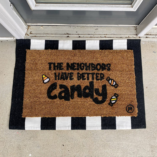 THE NEIGHBORS HAVE BETTER CANDY HALLOWEEN MAT