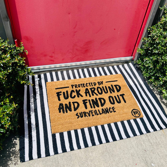 THIS HOUSE IS PROTECTED BY FUCK AROUND AND FIND OUT SURVEILLANCE MAT
