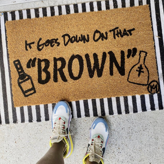 IT GOES DOWN ON THAT BROWN MAT
